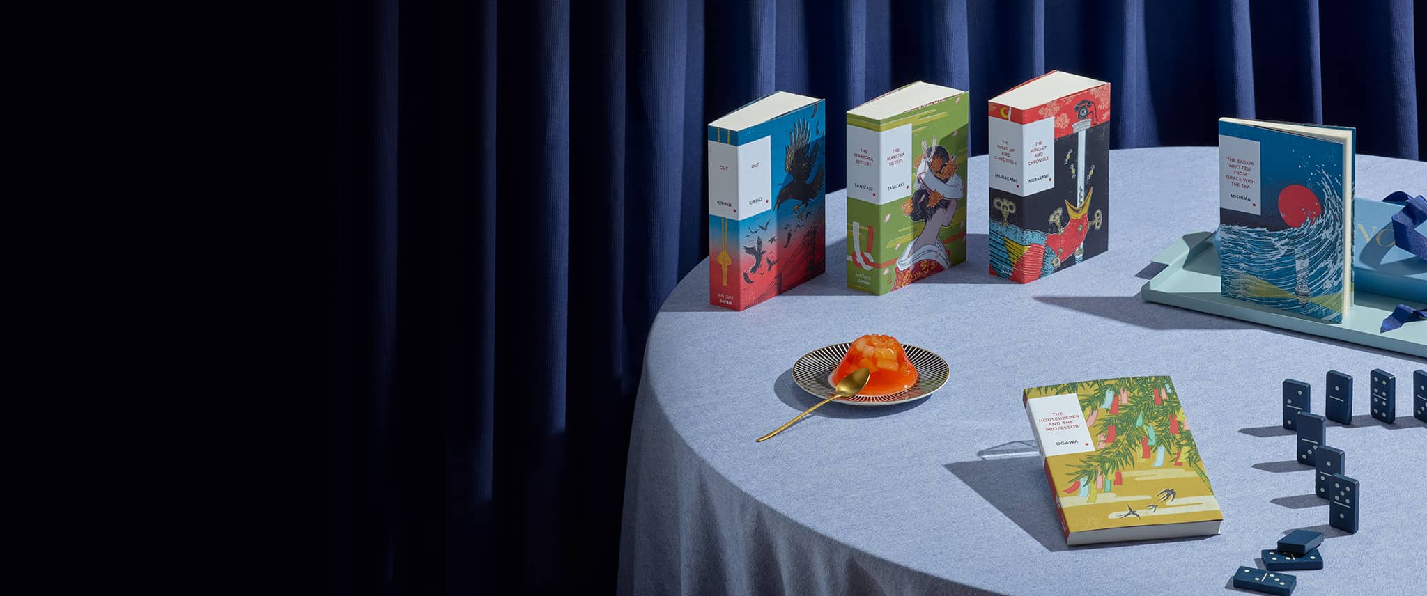 Vintage Japanese Classics on a blue clothed table with jelly and dominos