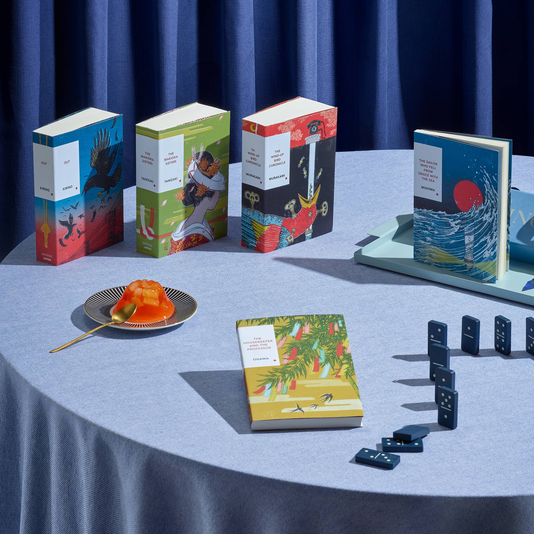 Vintage Japanese Classics on a blue clothed table with jelly and dominos